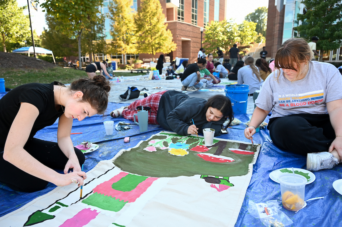 Homecoming Banner painting, Sunday, Oct. 20th, 2024 on Vine Street.
