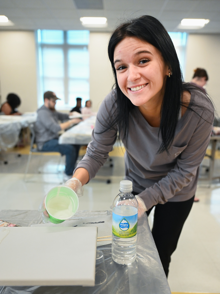 Students in Katelyn Hancock’s Ethics in Criminal Justice class participates in a paint pouring project Tuesday, Nov. 5, 2024 in 541 McCalllie.