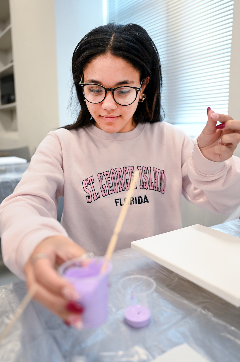 Students in Katelyn Hancock’s Ethics in Criminal Justice class participates in a paint pouring project Tuesday, Nov. 5, 2024 in 541 McCalllie.