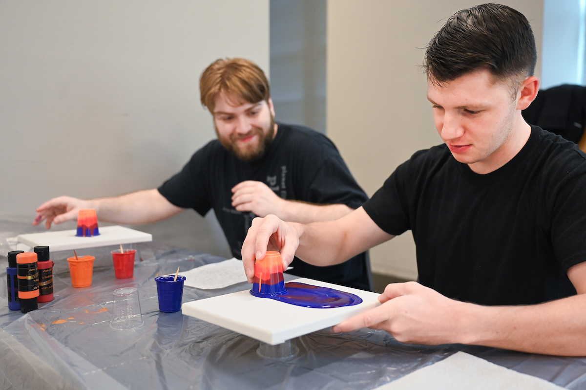 Students in Katelyn Hancock’s Ethics in Criminal Justice class participates in a paint pouring project Tuesday, Nov. 5, 2024 in 541 McCalllie.