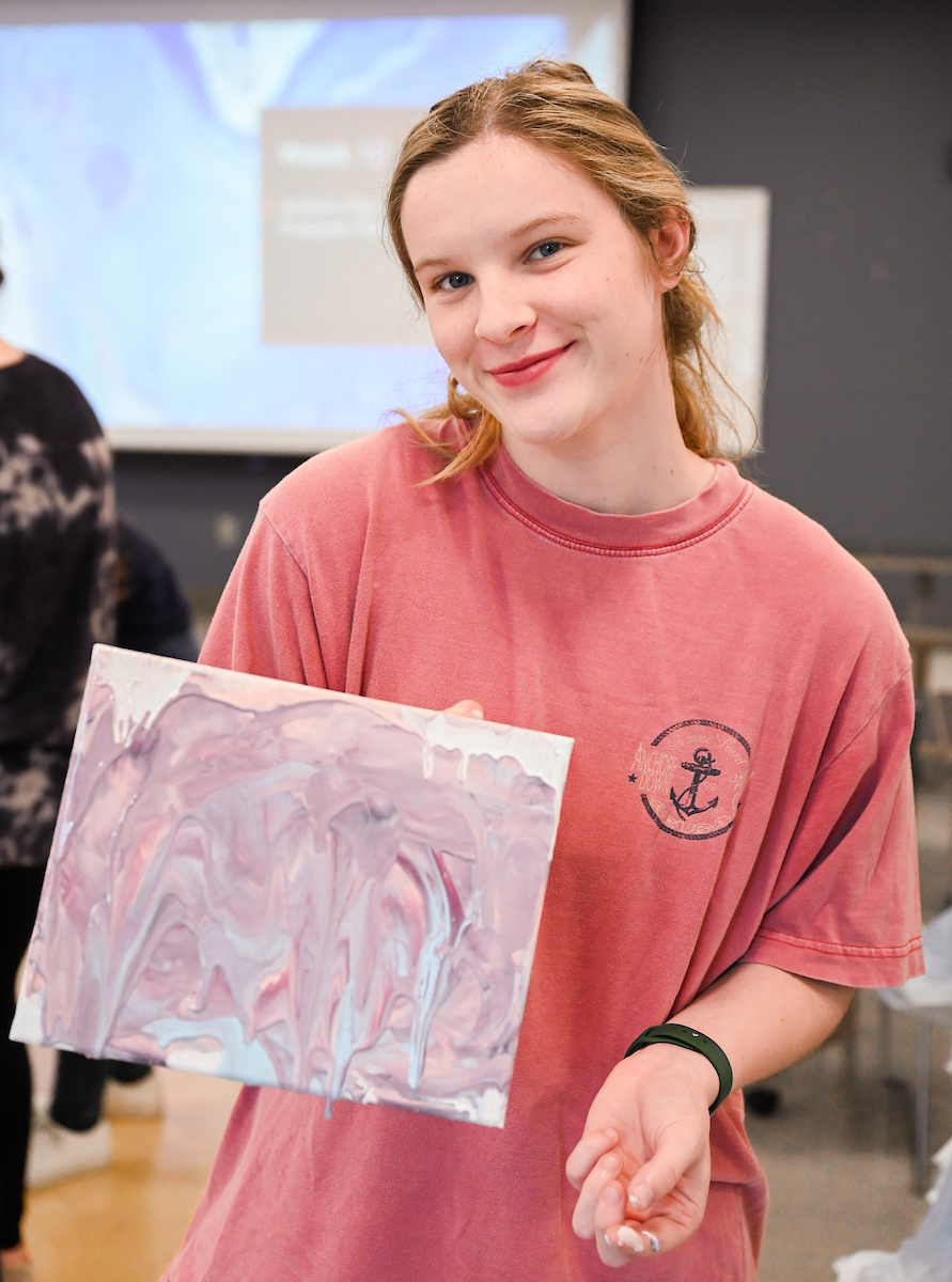 Students in Katelyn Hancock’s Ethics in Criminal Justice class participates in a paint pouring project Tuesday, Nov. 5, 2024 in 541 McCalllie.