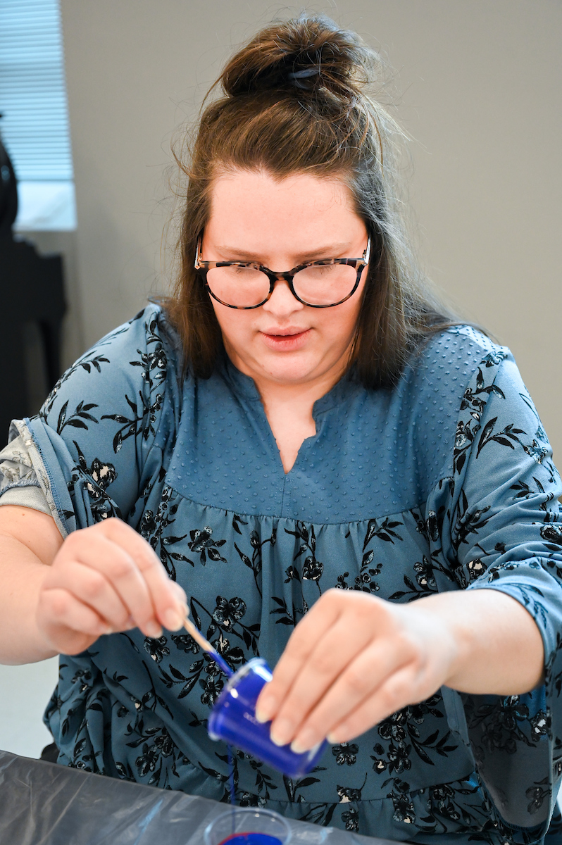 Students in Katelyn Hancock’s Ethics in Criminal Justice class participates in a paint pouring project Tuesday, Nov. 5, 2024 in 541 McCalllie.