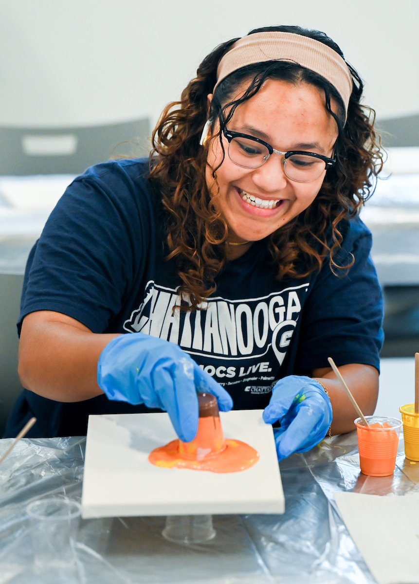 Students in Katelyn Hancock’s Ethics in Criminal Justice class participates in a paint pouring project Tuesday, Nov. 5, 2024 in 541 McCalllie.