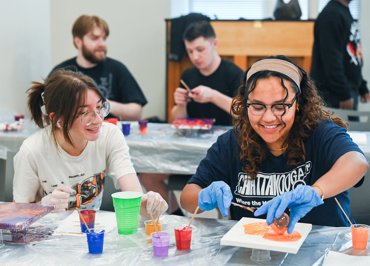 Students in Katelyn Hancock’s Ethics in Criminal Justice class participates in a paint pouring project Tuesday, Nov. 5, 2024 in 541 McCalllie.