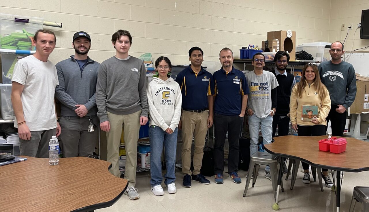 Jacob Pratt, left, David Brown, Eli Duran, Karla Coronado, Dr. Reetesh Ranjan, Dr. Murat Barisik, Atal Bhowmik, Khowshik Dey, Ezgi Satiroglu and Ege Can Ek recently participated in a National Chemistry Week event at Orchard Knob Elementary School. Photo by Dr. Sandra Affare.