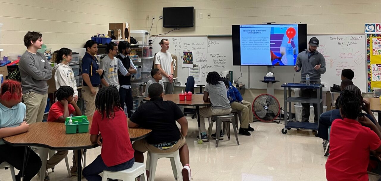 David Brown, a UTC senior majoring in mechanical engineering, presented experiments to the Orchard Knob Elementary School students. Photo by Dr. Sandra Affare.