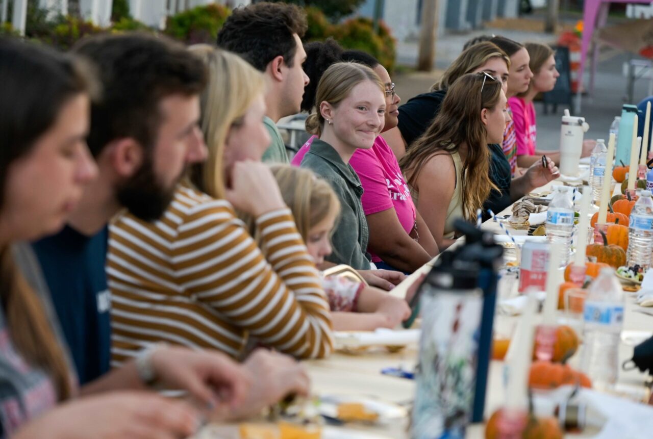 Many of the MOMentum Network's employees, volunteers, moms and supporters joined them for a meal as part of their anniversary celebration. Photo by Bethany Cothran.