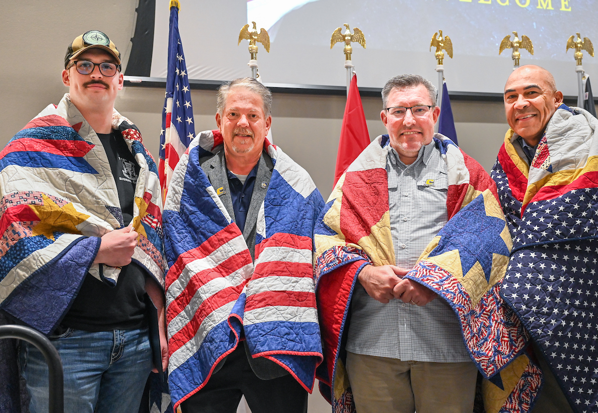 Quilts of Valor recipients Garrett Davis (left), Mike Breakey, Donnie Hodge and Victor Howell.