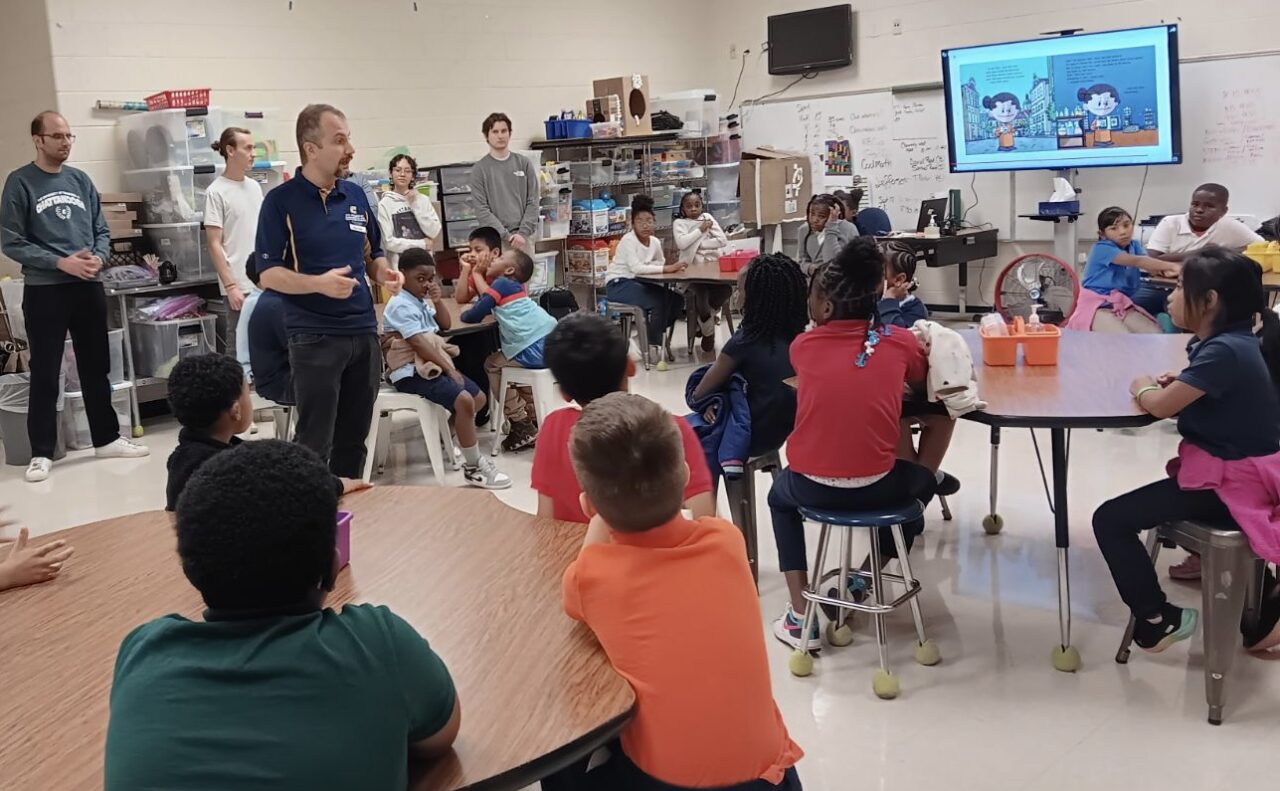 UTC Assistant Professor of Mechanical Engineering Murat Barisik talks to the Orchard Knob Elementary School students. Photo by Dr. Sandra Affare.