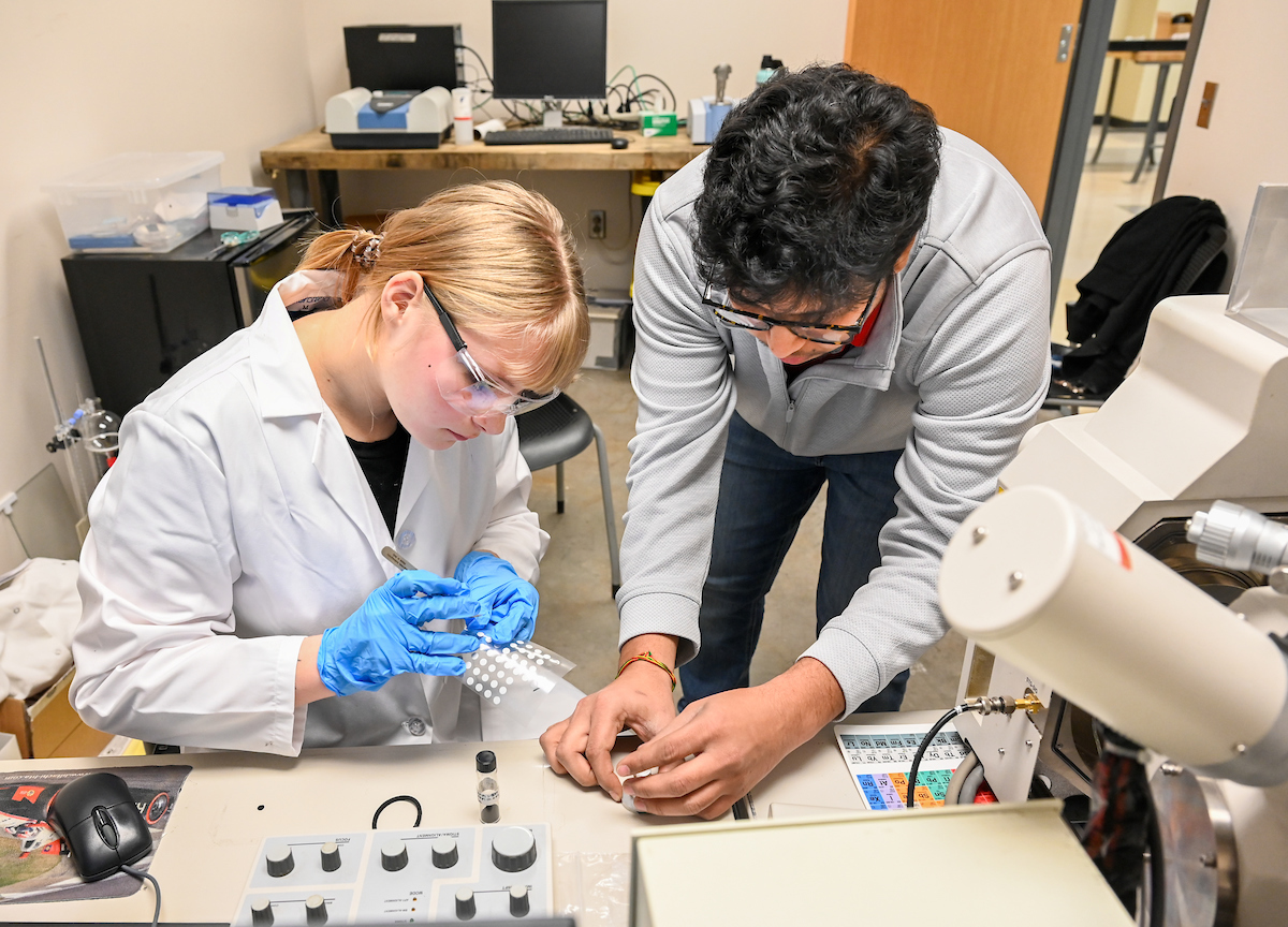 Chemical engineering major Katelyn Hamilton, left, and Dr. Venkateswara Rao Kode perform research in the College of Engineering and Computer Science. Photo by Angela Foster.