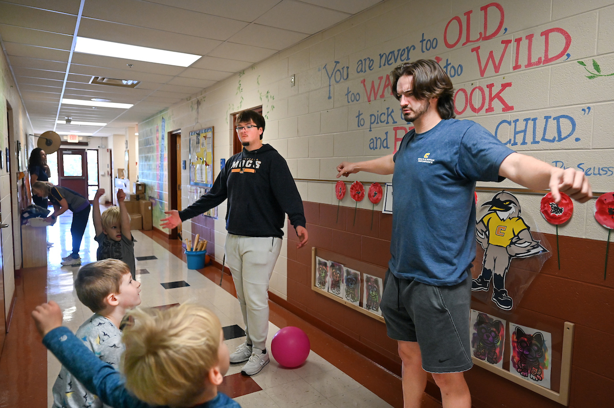 Jamie Harvey’s Physical Education in the Elementary School students work with children Wednesday, Nov. 13, 2024 at the UTC Children’s Center.