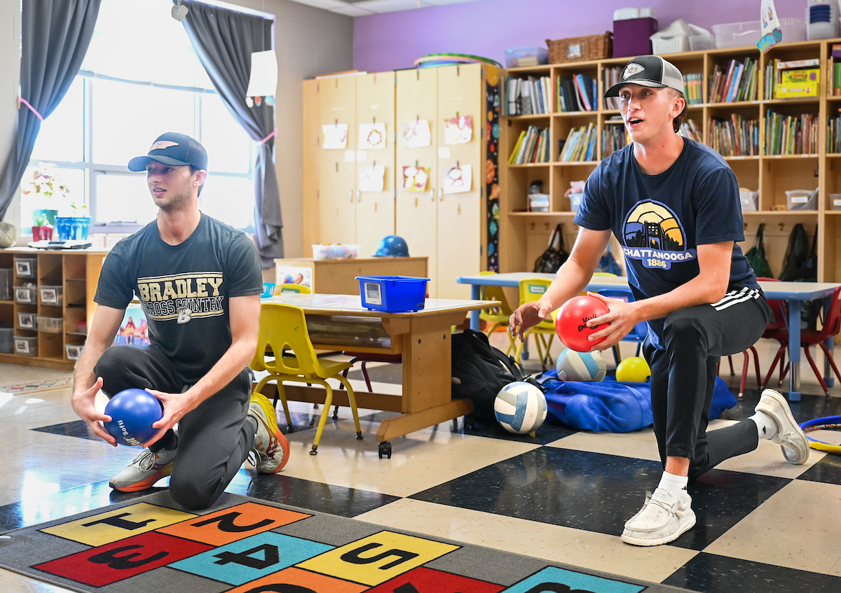 Jamie Harvey’s Physical Education in the Elementary School students work with children Wednesday, Nov. 13, 2024 at the UTC Children’s Center.