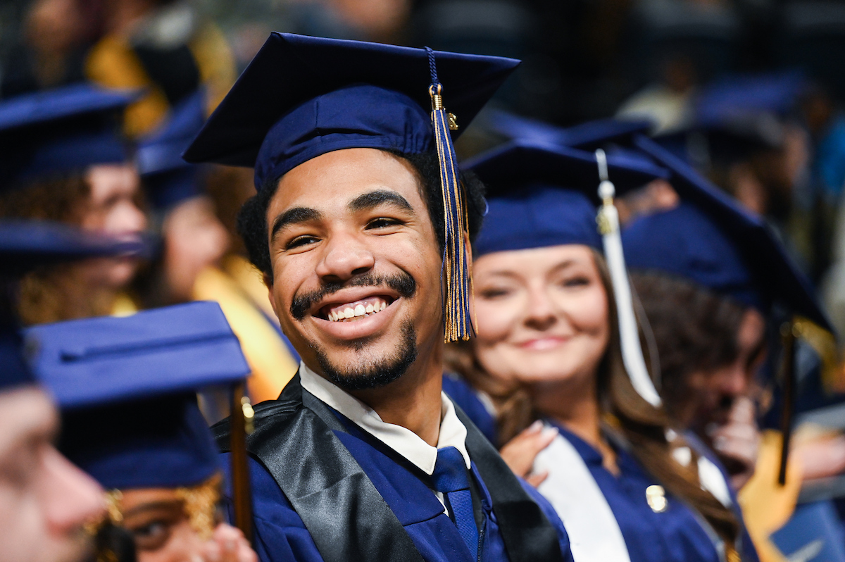 Liomar Mercedes-Sosa sits Saturday, Dec. 14, 2024 during the University of Tennessee at Chattanooga undergraduate commencement ceremony in McKenzie Arena.