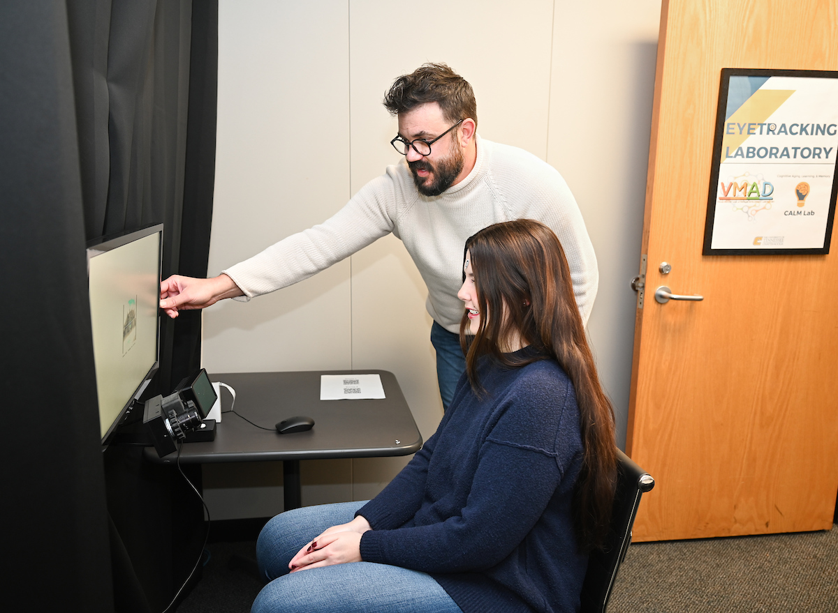Dr. Bret Eschman and graduate student Bailee Smith in the Visual Memory and Attention Development Lab. Photo by Angela Foster.