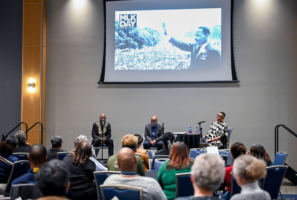 Michael Williams, Elijah Cameron and Nicole Brown speak during the MLK Day brunch in the Tennessee Room. Photo by Angela Foster.