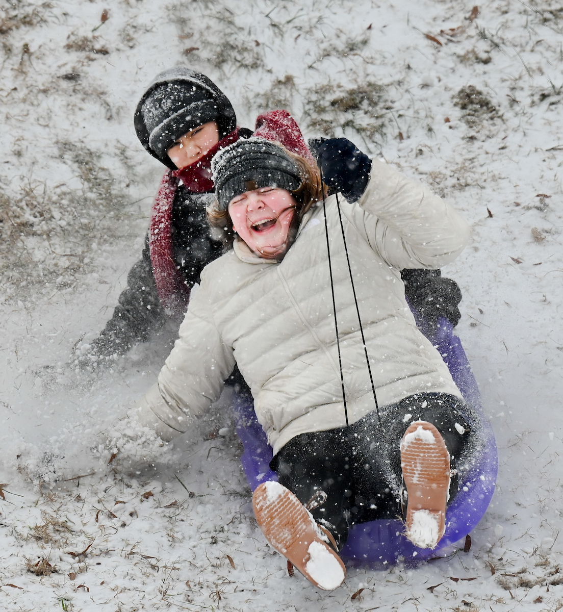 Students play in the snow Friday, Jan. 10, 2025.