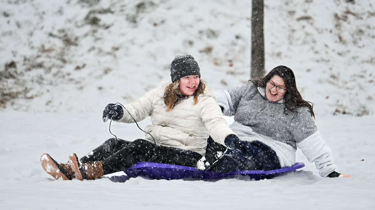 Students play in the snow Friday, Jan. 10, 2025.