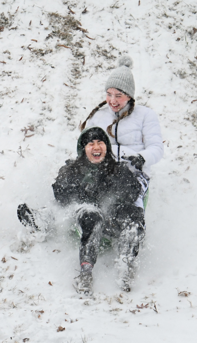 Students play in the snow Friday, Jan. 10, 2025.