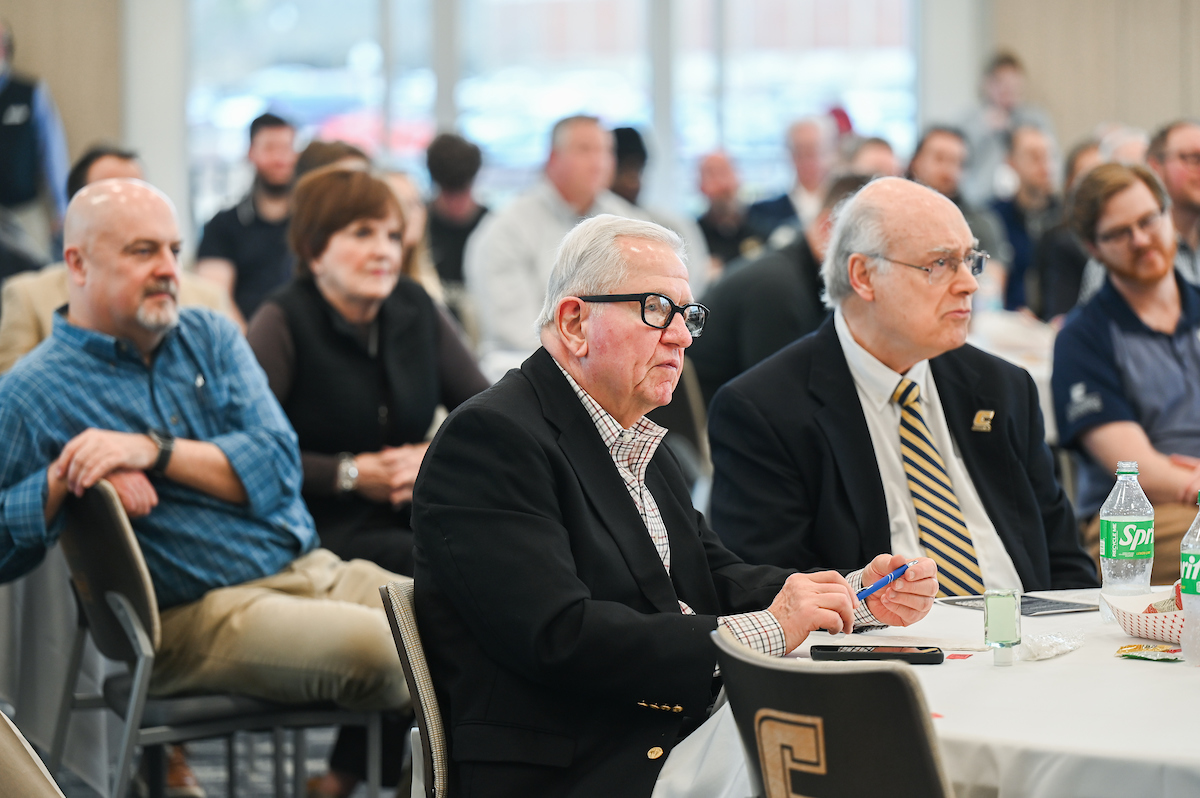 UT System President Randy Boyd, Jay Green and Brad Humphreys participate Thursday, Feb. 6, 2025 in a panel discussion about the economics of sports.