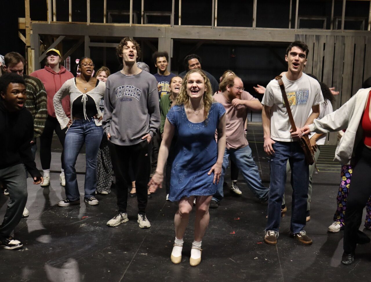 Pearson Smith (center) rehearses with the cast of UTC Theater Co.'s "Bright Star"