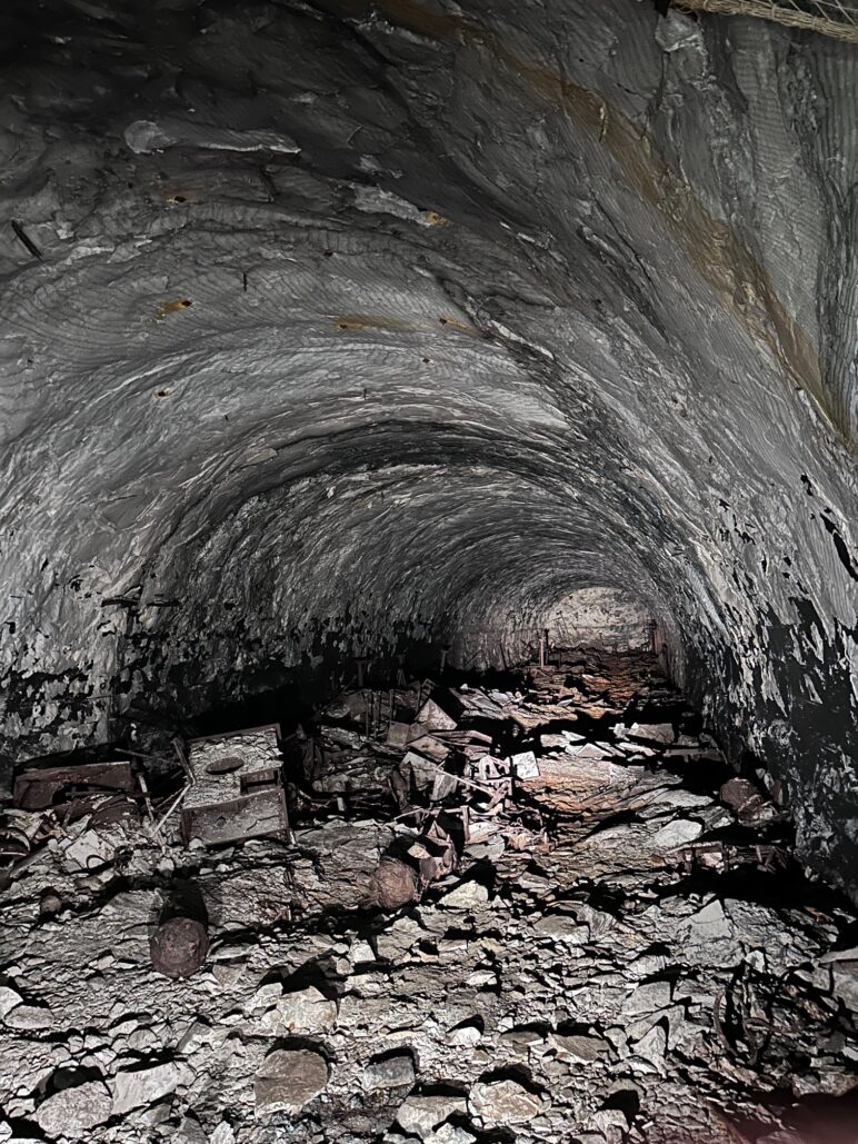 The inside of a Mittelbau-Dora tunnel where groups of prisoners were made to live and where partial assembly of the rockets was completed. Photo courtesy of Grace Allen.