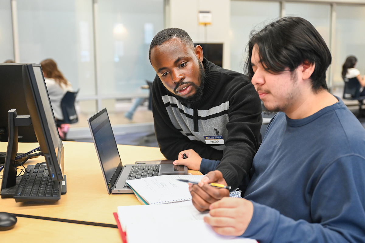 Mark Horlu, left, is the assistant director of the UTC Math Plaza. Photo by Angela Foster.