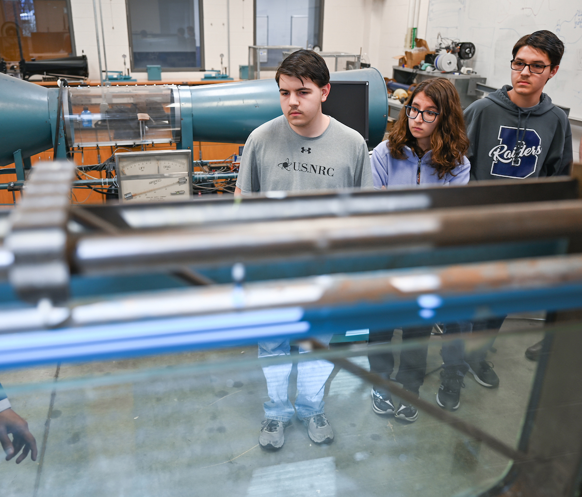 Isabella, Luke and Matthew Riggs work Tuesday, Feb. 25, 2025 in Reetesh Ranjan's fluids lab in the Engineering and Computer Science building. Matthew, taller, glasses, dark sweatshirt Luke, USNRC gray shirt, no glasses