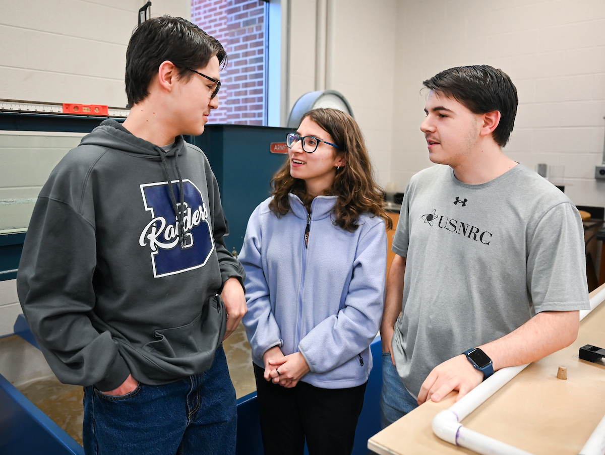 "We all work together to ensure that everyone understands everything," Isabella Riggs said of her brothers Matthew (left) and Luke.