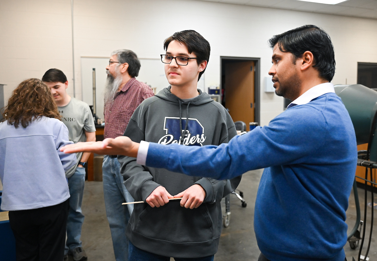 Isabella, Luke and Matthew Riggs work Tuesday, Feb. 25, 2025 in Reetesh Ranjan's fluids lab in the Engineering and Computer Science building. Matthew, taller, glasses, dark sweatshirt Luke, USNRC gray shirt, no glasses