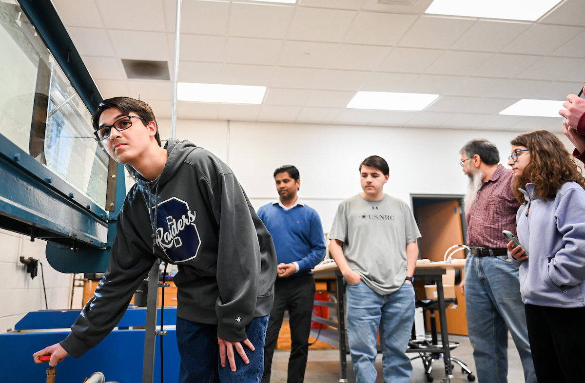 Isabella, Luke and Matthew Riggs work Tuesday, Feb. 25, 2025 in Reetesh Ranjan's fluids lab in the Engineering and Computer Science building. Matthew, taller, glasses, dark sweatshirt Luke, USNRC gray shirt, no glasses