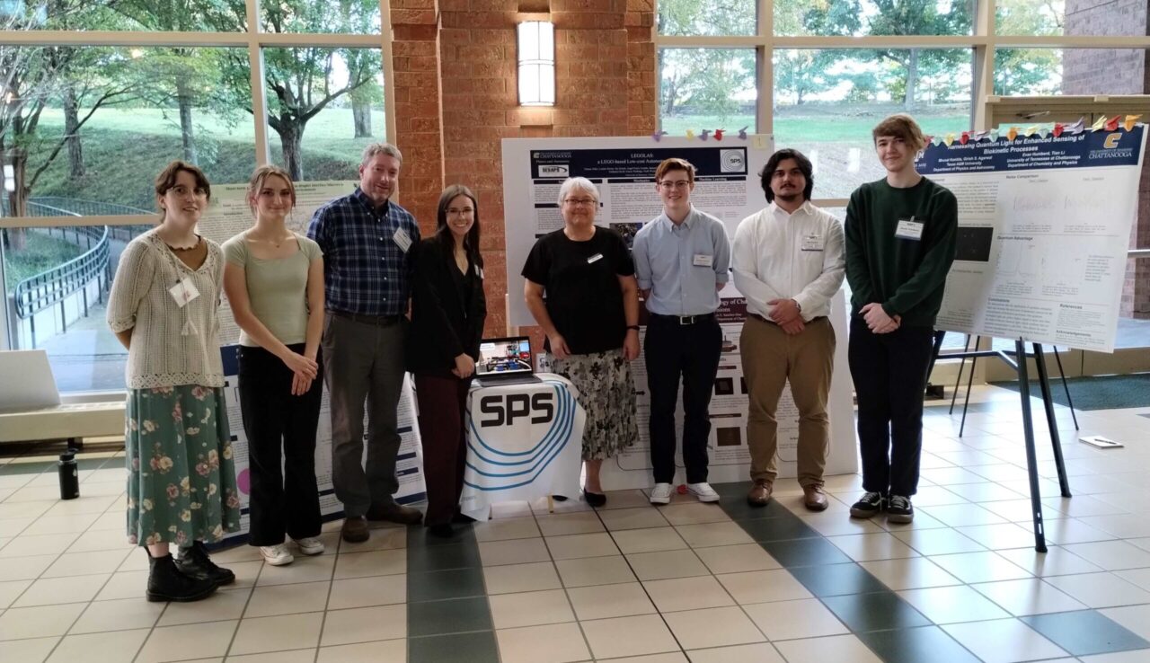 UTC Society of Physics Students members present their LEGOLAS project at the 2024 Southeastern Section of the American Physical Society meeting in Charlotte, North Carolina. From left: Emery Rutledge, Olivia Ziemer, Dr. Joshua Hamblen, Megan Black, Dr. Tatiana Allen, Samuel Glandon, Ike Deitch and Evan Humberd (photo courtesy of Dr. Tatiana Allen).