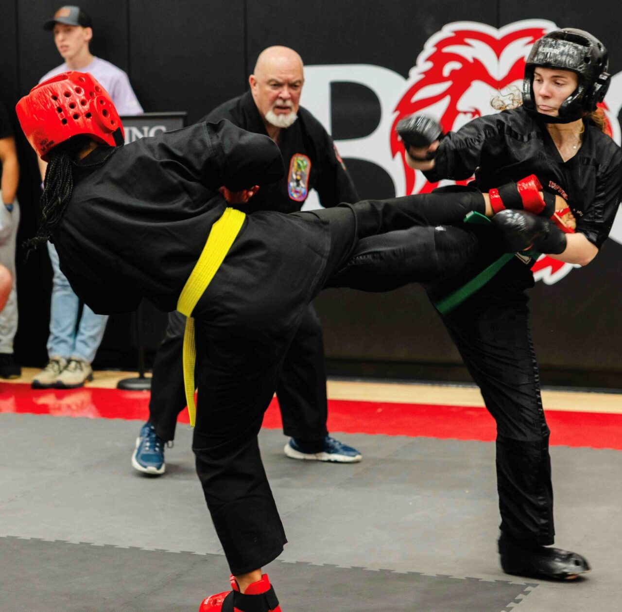 UTC sophomore Hailey Henderson (in yellow belt) clashes with a higher rank at the Bryan Open Karate Tournament (photo credit: Bryan College).