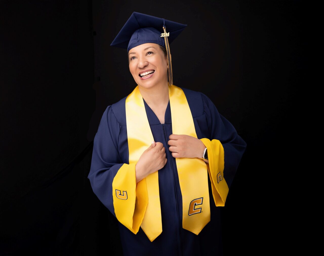 Michele Pruitt walked across the McKenzie Arena stage during the December 2024 undergraduate commencement ceremony, the recipient of a Bachelor of Integrated Studies degree (photo courtesy of Michele Pruitt).