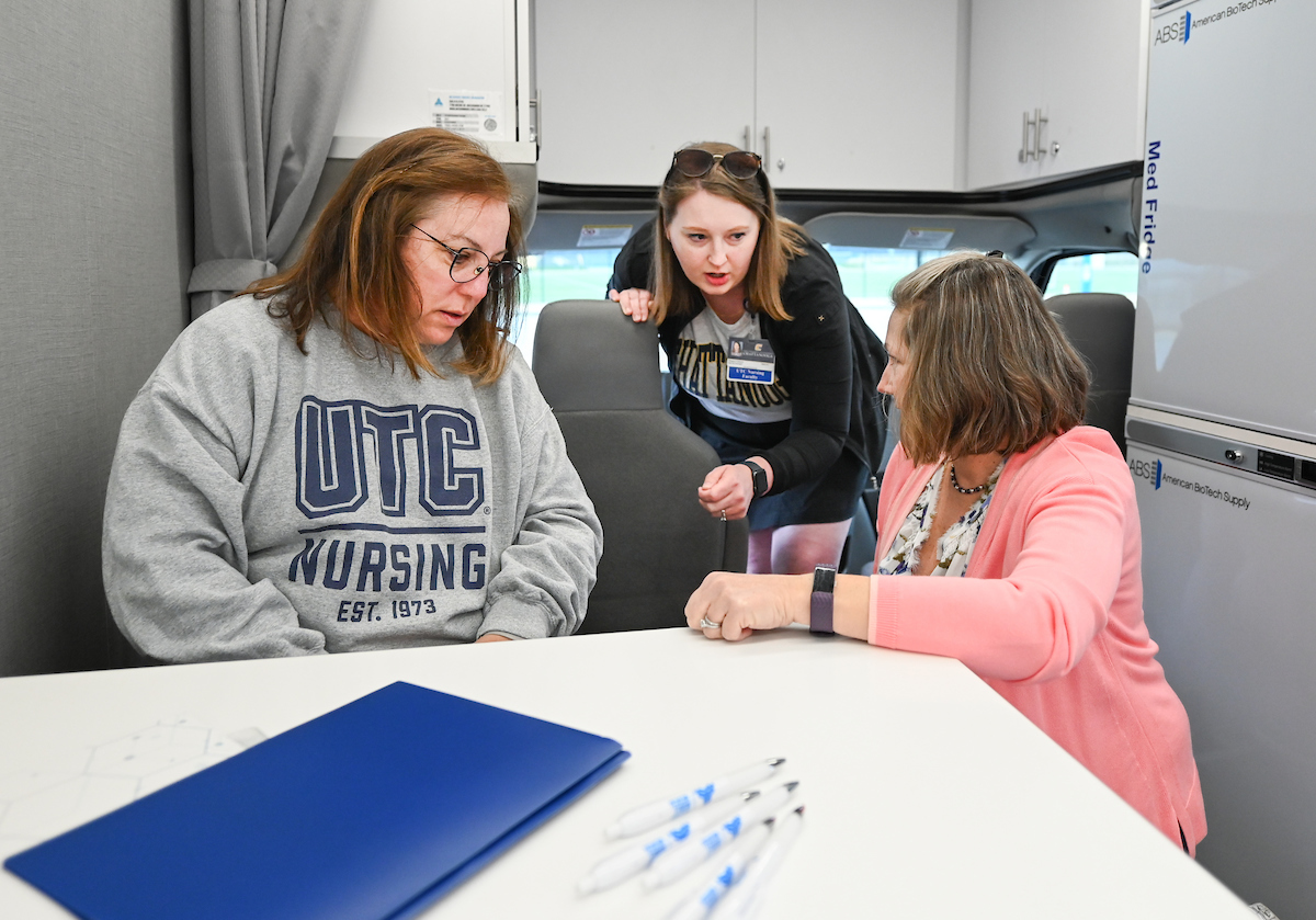 Faculty, staff and students check out the Mobile Moc van on Thursday, Mar. 13, 2025. The van will provide medical care to rural areas.