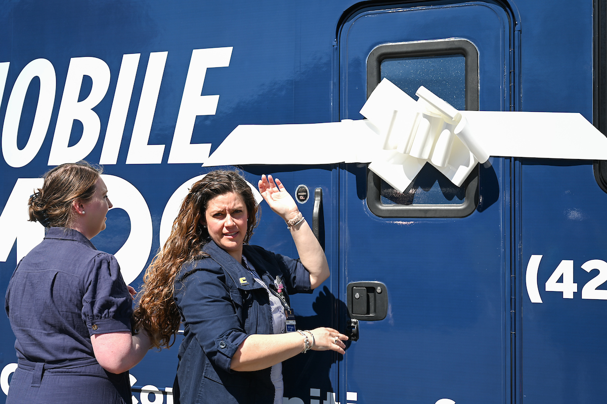 UTC faculty, staff and students, along with elected officials, attend the ribbon cutting for the Mobile Moc clinic Tuesday, Mar. 25, 2025 at the Rhea County Welcome Center.