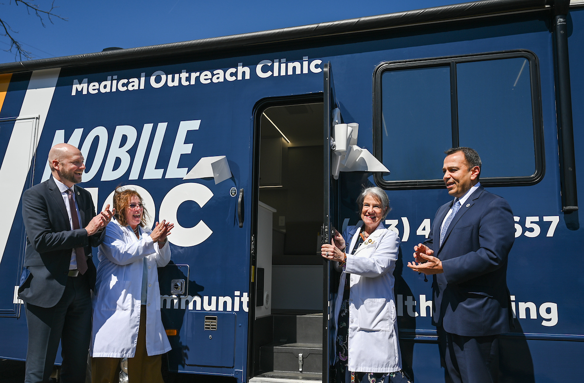 Tennessee Department of Disability and Aging Commissioner Brad Turner, left, Dr. Kristi Wick, Dr. Chris Smith and Tennessee Department of Health Commissioner Ralph Alvarado at the ribbon-cutting ceremony for MobileMOC on Tuesday, March 25, at the Rhea County Welcome Center in Dayton, Tennessee. Photo by Angela Foster/UTC.