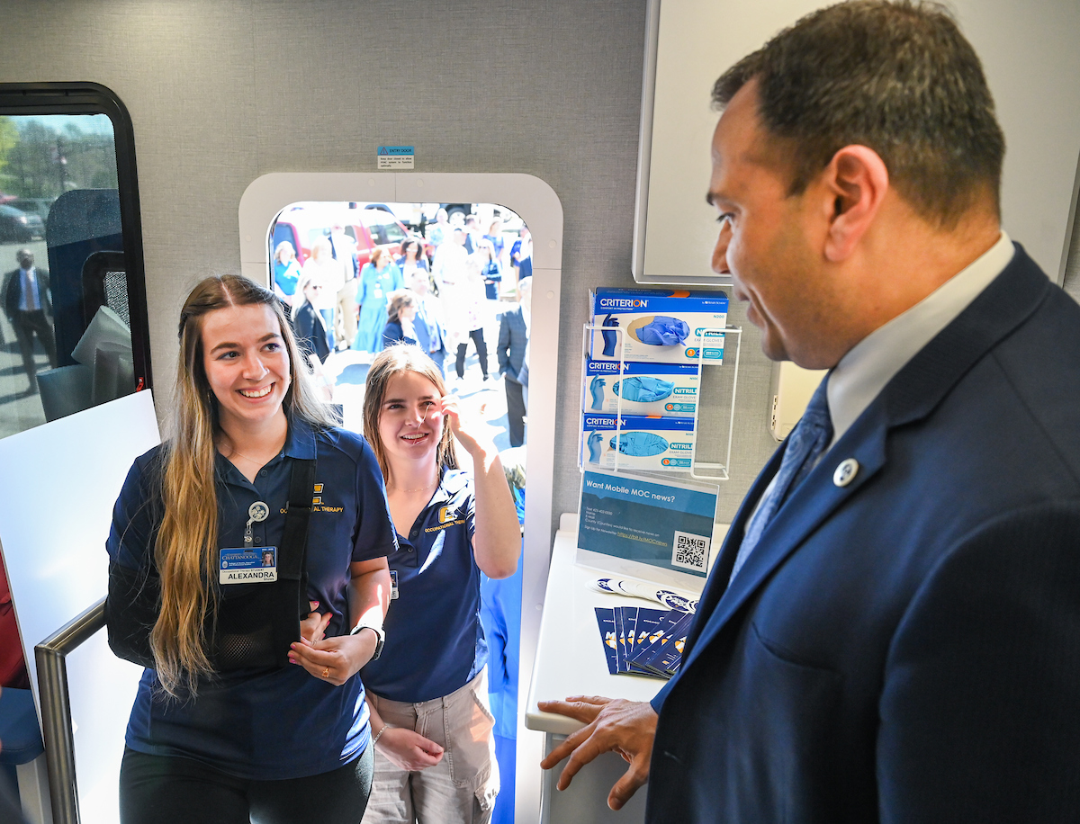 UTC faculty, staff and students, along with elected officials, attend the ribbon cutting for the Mobile Moc clinic Tuesday, Mar. 25, 2025 at the Rhea County Welcome Center.