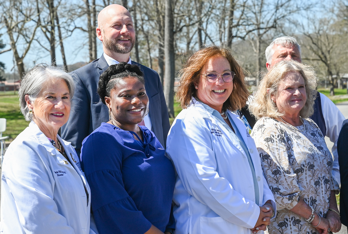 UTC faculty, staff and students, along with elected officials, attend the ribbon cutting for the Mobile Moc clinic Tuesday, Mar. 25, 2025 at the Rhea County Welcome Center.