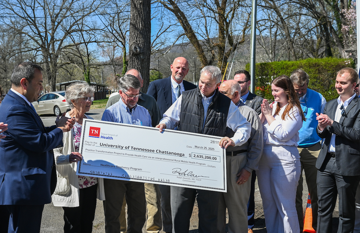 UTC faculty, staff and students, along with elected officials, attend the ribbon cutting for the Mobile Moc clinic Tuesday, Mar. 25, 2025 at the Rhea County Welcome Center.