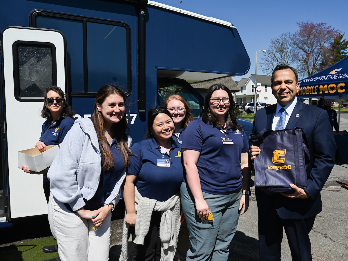 UTC faculty, staff and students, along with elected officials, attend the ribbon cutting for the Mobile Moc clinic Tuesday, Mar. 25, 2025 at the Rhea County Welcome Center.