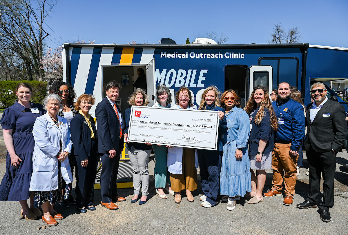 UTC faculty, staff and students, along with elected officials, attend the ribbon cutting for the Mobile Moc clinic Tuesday, Mar. 25, 2025 at the Rhea County Welcome Center.