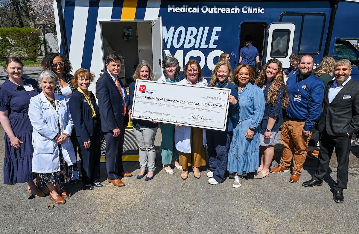 UTC faculty, staff and students, along with elected officials, attend the ribbon cutting for the Mobile Moc clinic Tuesday, Mar. 25, 2025 at the Rhea County Welcome Center.
