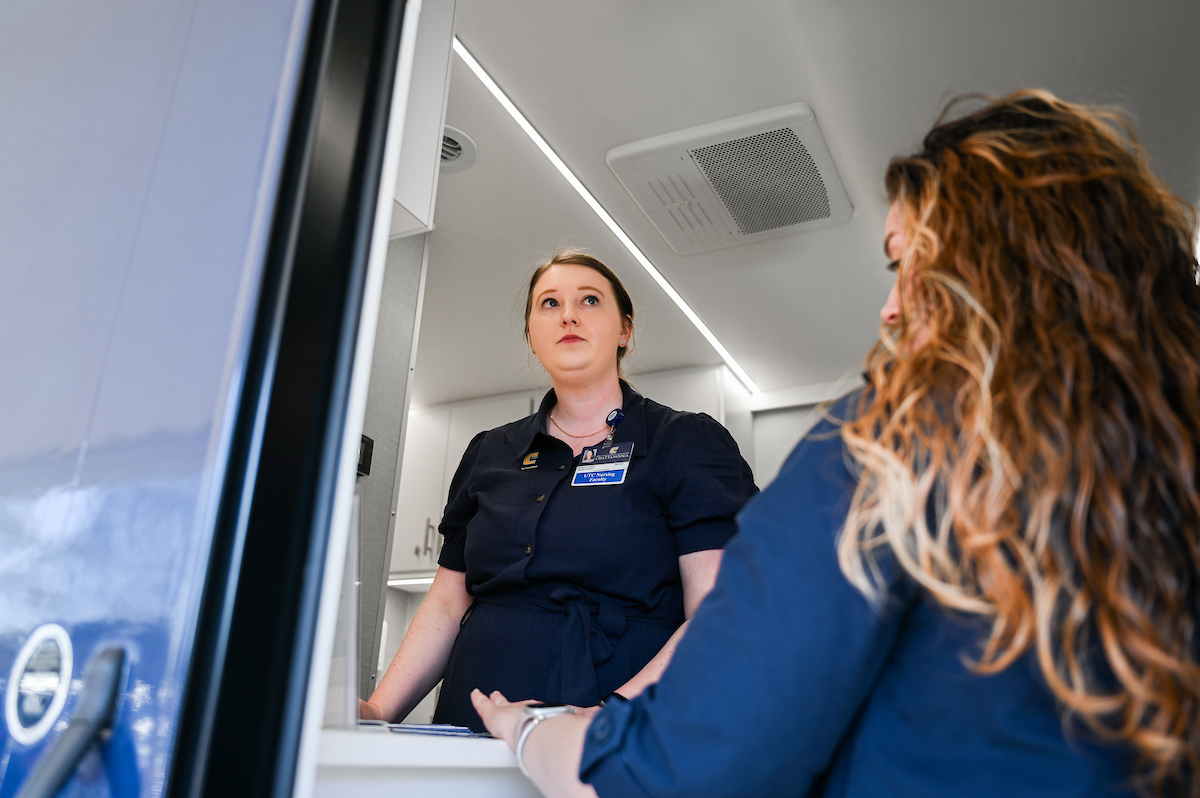 UTC faculty, staff and students, along with elected officials, attend the ribbon cutting for the Mobile Moc clinic Tuesday, Mar. 25, 2025 at the Rhea County Welcome Center.