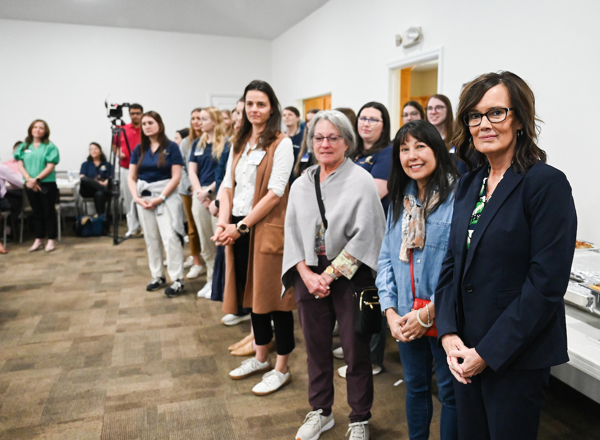 UTC faculty, staff and students, along with elected officials, attend the ribbon cutting for the Mobile Moc clinic Tuesday, Mar. 25, 2025 at the Rhea County Welcome Center.