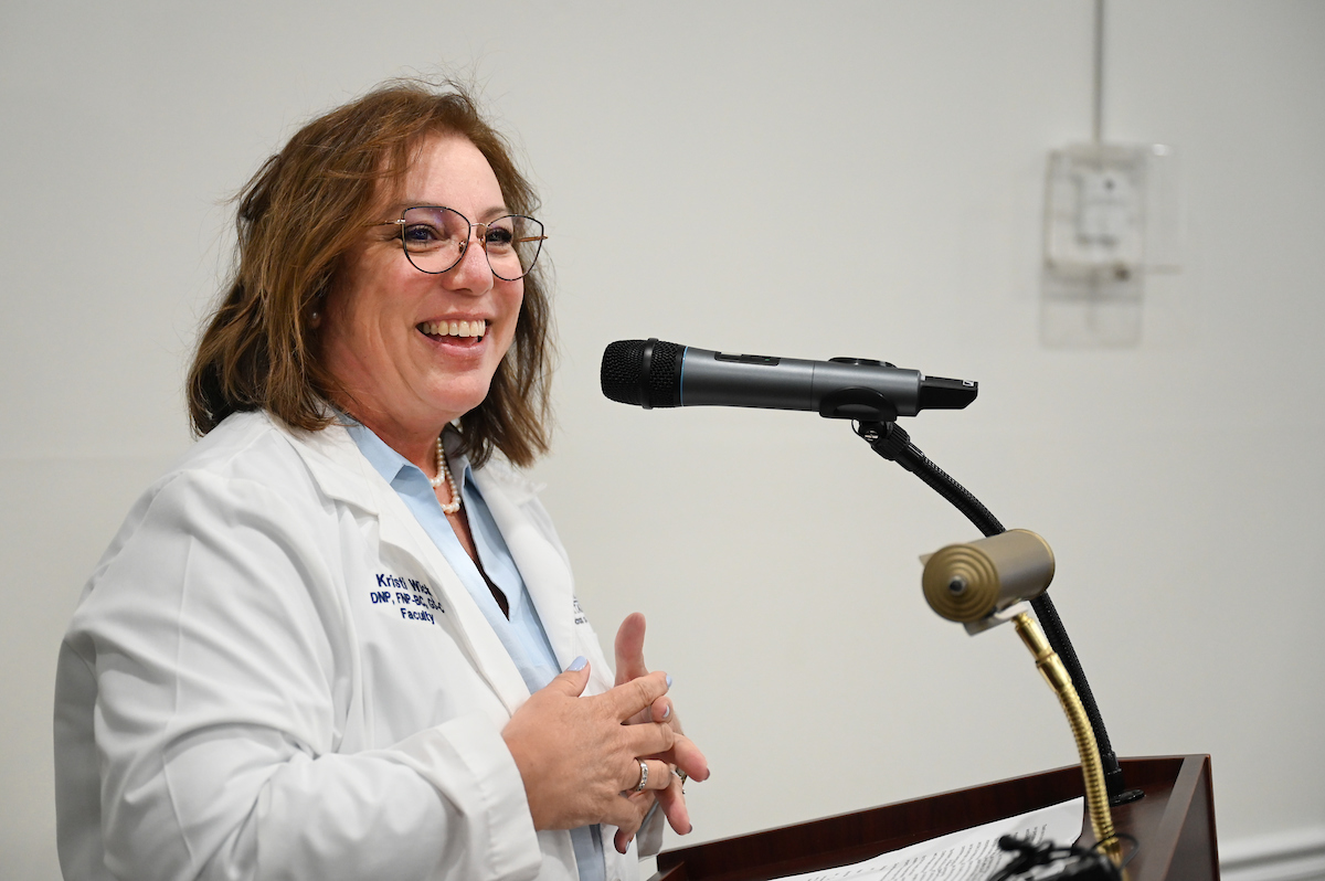 UTC faculty, staff and students, along with elected officials, attend the ribbon cutting for the Mobile Moc clinic Tuesday, Mar. 25, 2025 at the Rhea County Welcome Center.