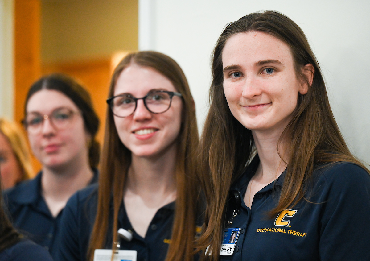 UTC faculty, staff and students, along with elected officials, attend the ribbon cutting for the Mobile Moc clinic Tuesday, Mar. 25, 2025 at the Rhea County Welcome Center.
