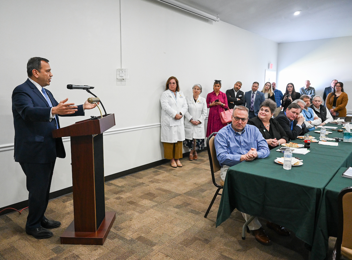UTC faculty, staff and students, along with elected officials, attend the ribbon cutting for the Mobile Moc clinic Tuesday, Mar. 25, 2025 at the Rhea County Welcome Center.