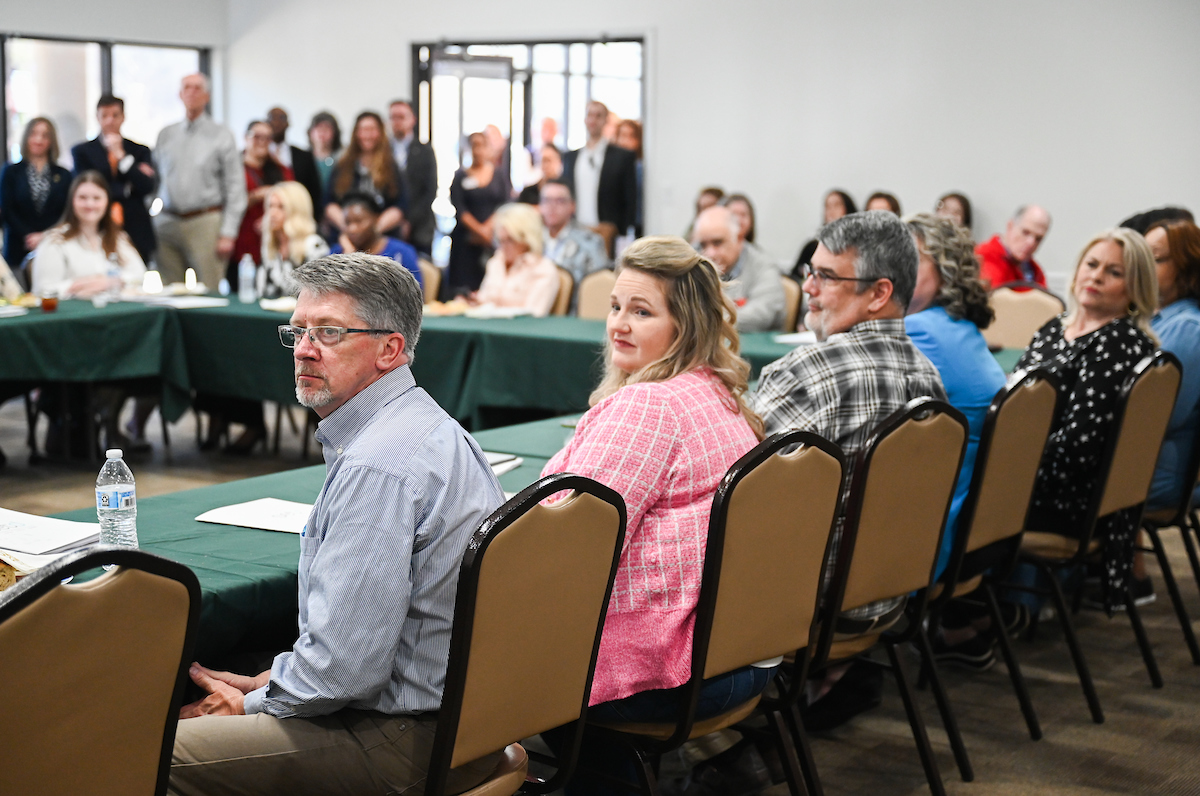 UTC faculty, staff and students, along with elected officials, attend the ribbon cutting for the Mobile Moc clinic Tuesday, Mar. 25, 2025 at the Rhea County Welcome Center.