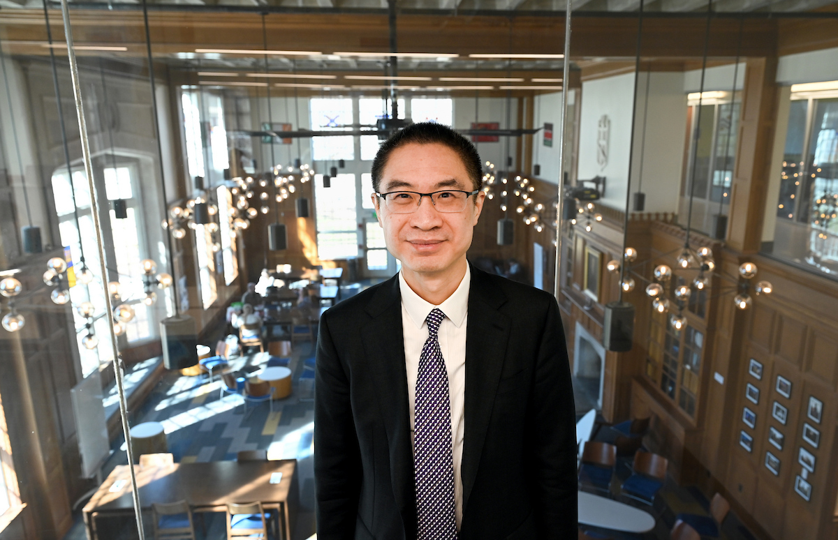 Richard Zhang stands in the Guerry Center, home of the UTC Honors College.
