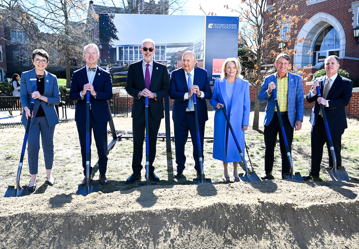 Officials attend a groundbreaking ceremony Monday, Mar. 3, 2025 for the addition to the Gary W. Rollins Business school.